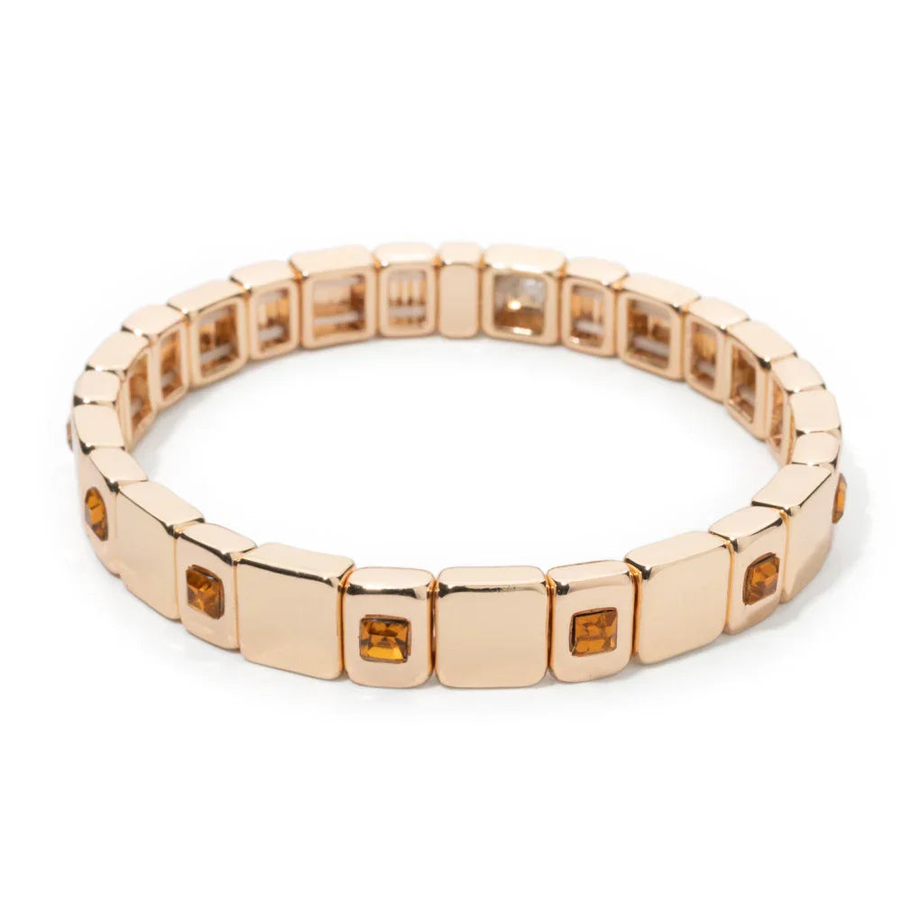 Goldene Stretch-Armbänder mit bunten Kristallen