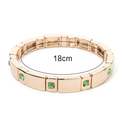 Goldene Stretch-Armbänder mit bunten Kristallen