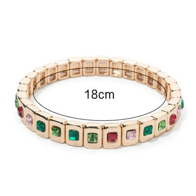 Goldene Stretch-Armbänder mit bunten Kristallen