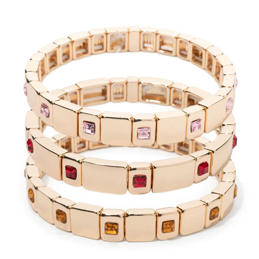 Goldene Stretch-Armbänder mit bunten Kristallen